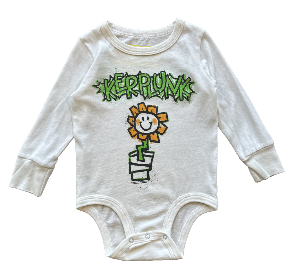 white baby onesie green day